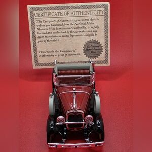 Red Vintage Model Car with Certificate